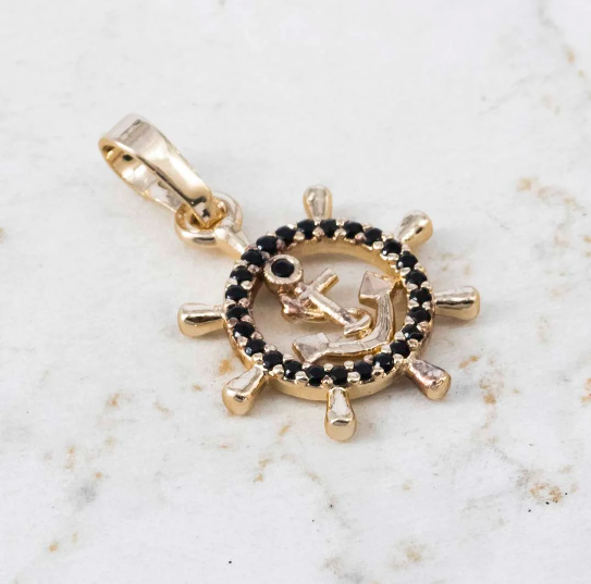 Dije timón circones negros