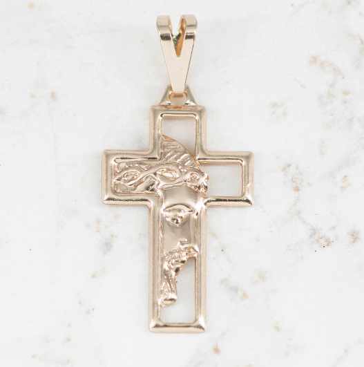 Dije silueta cruz rostro